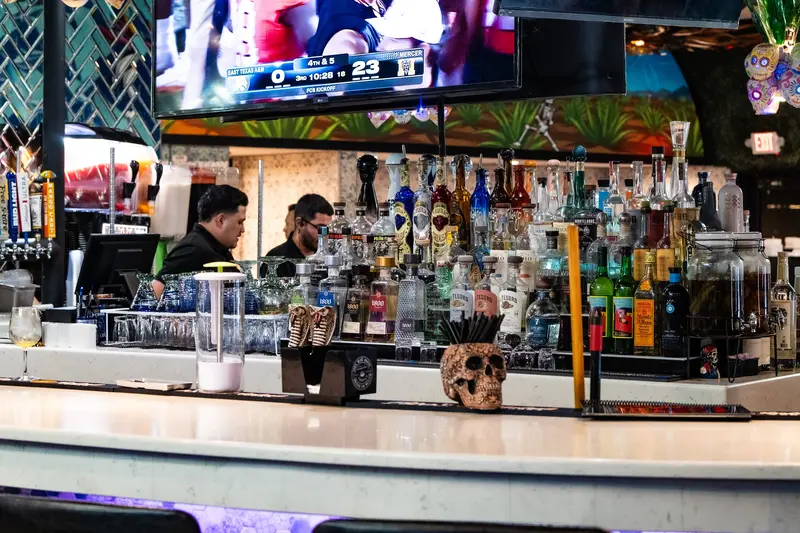 The back bar with sugar skulls at Viva Leawood