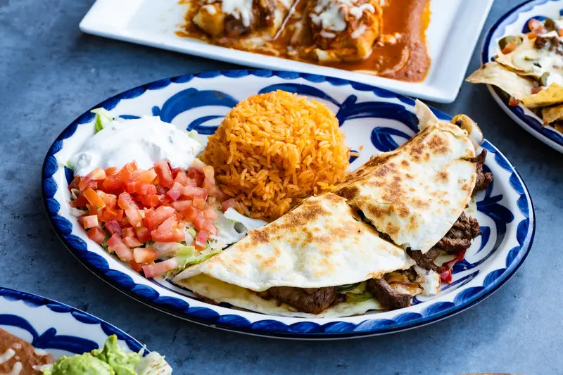 A quesadilla plate with rice at Viva Leawood